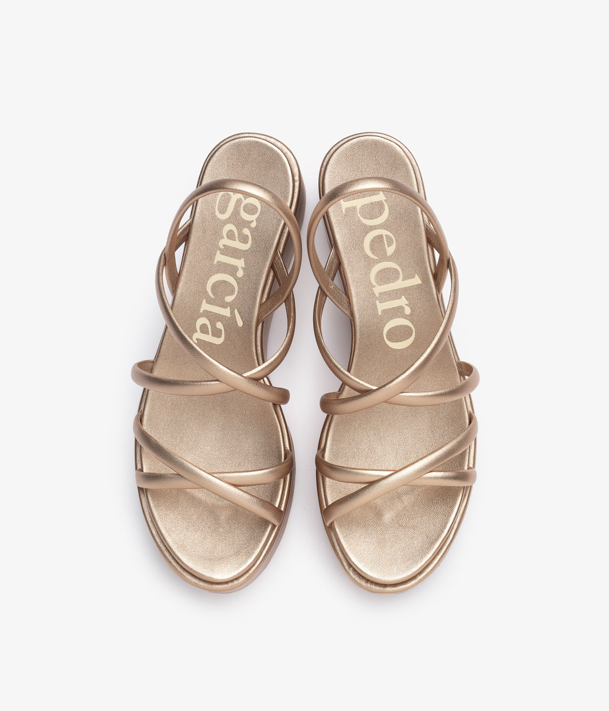 Anatomical flat sandal in metallic leather with crystals Bambina